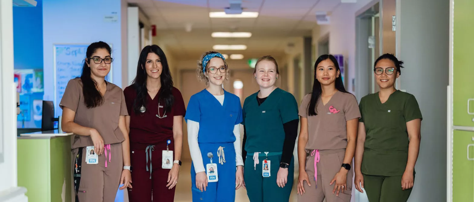 Group of nurses standing in corridor