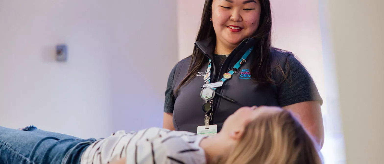 a health care provider speaking with a patient