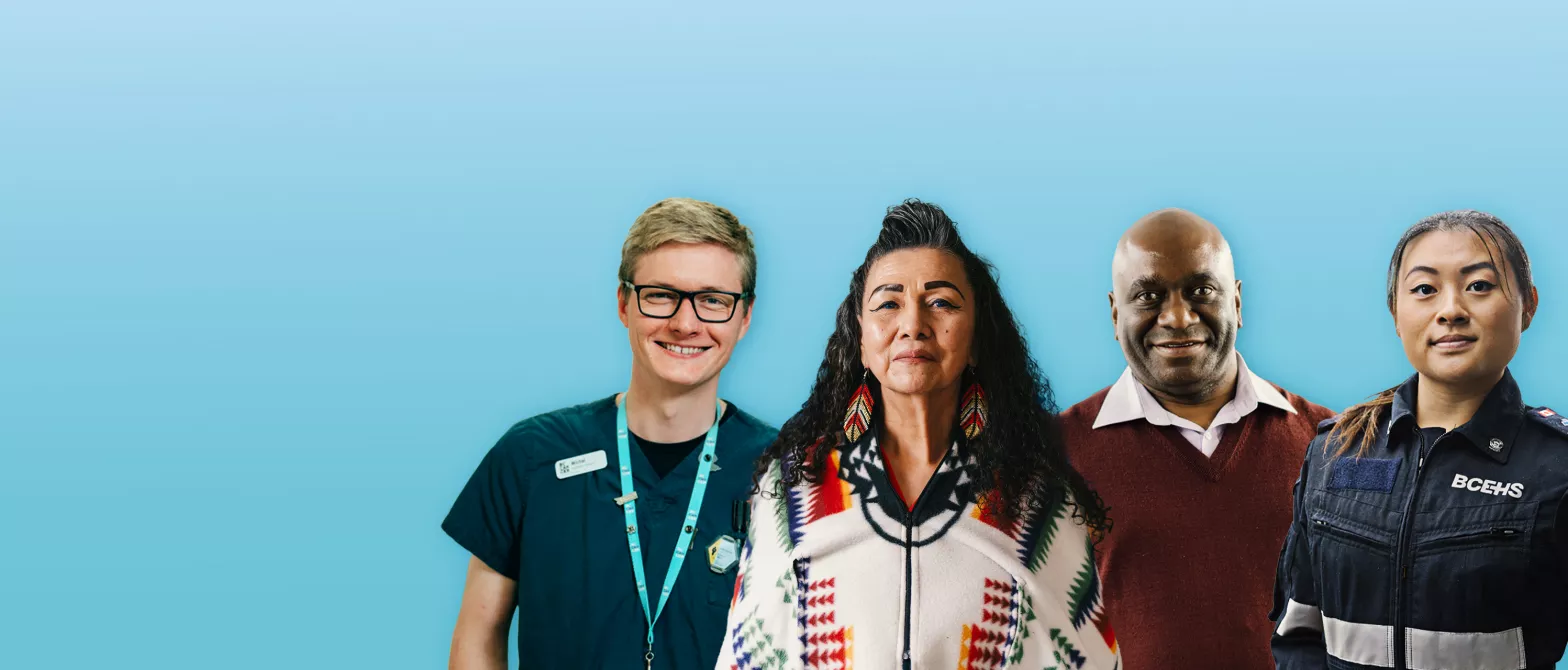 Four smiling staff members