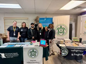 The Sanya'kula and BCMHSUS teams at a career fair