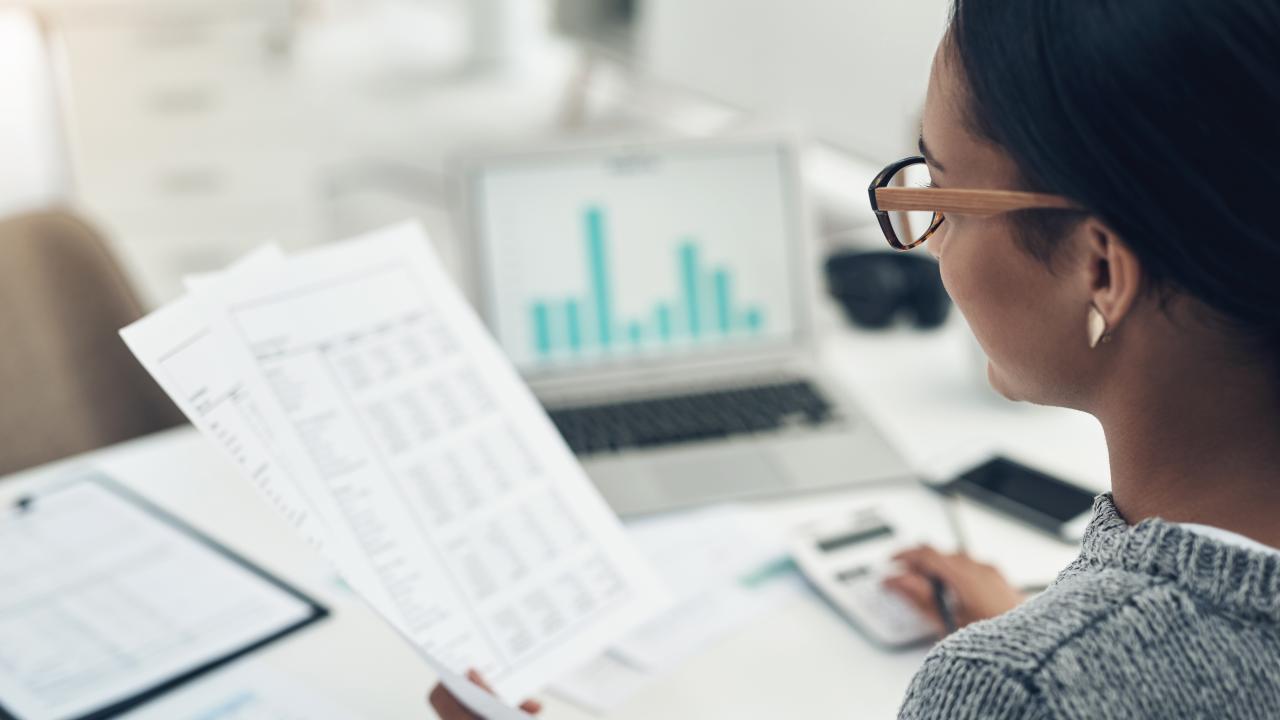 Woman reading report