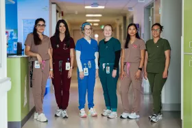 Group of nurses standing in corridor