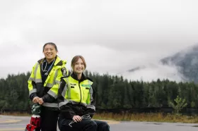 Two paramedics by a lake