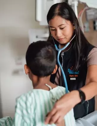 Nurse examines child