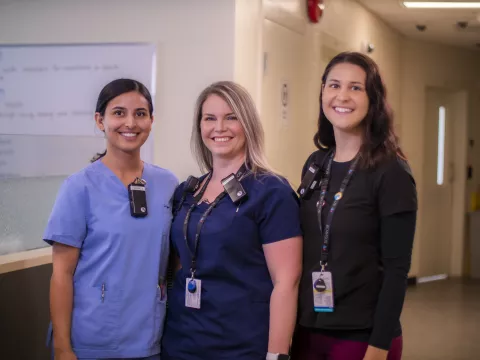 Three smiling nurses