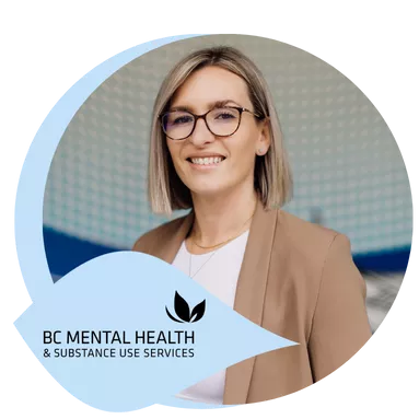 A woman posing for a photo in Red Fish Healing Centre