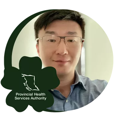 Male staff member smiling